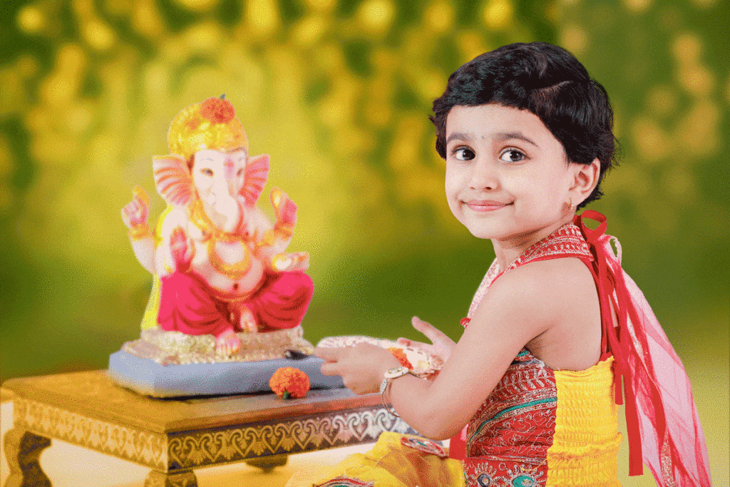 Girl-praying-to-Ganesha