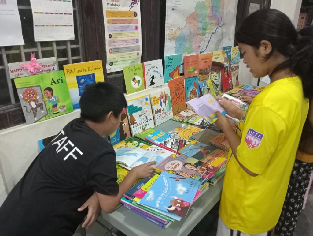 Children looking through books